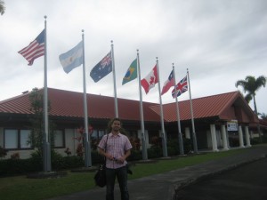 In front of the Gemini HQ at Hilo. notice the flags of all the partner countries