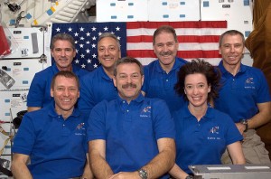 In-orbit portrait of the crew taken during the rest day after the service mission was completed.