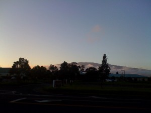 The Mauna Kea summit as seen from the Keck HQ. You can distinguish the telescope domes on the top (you need to zoom in)